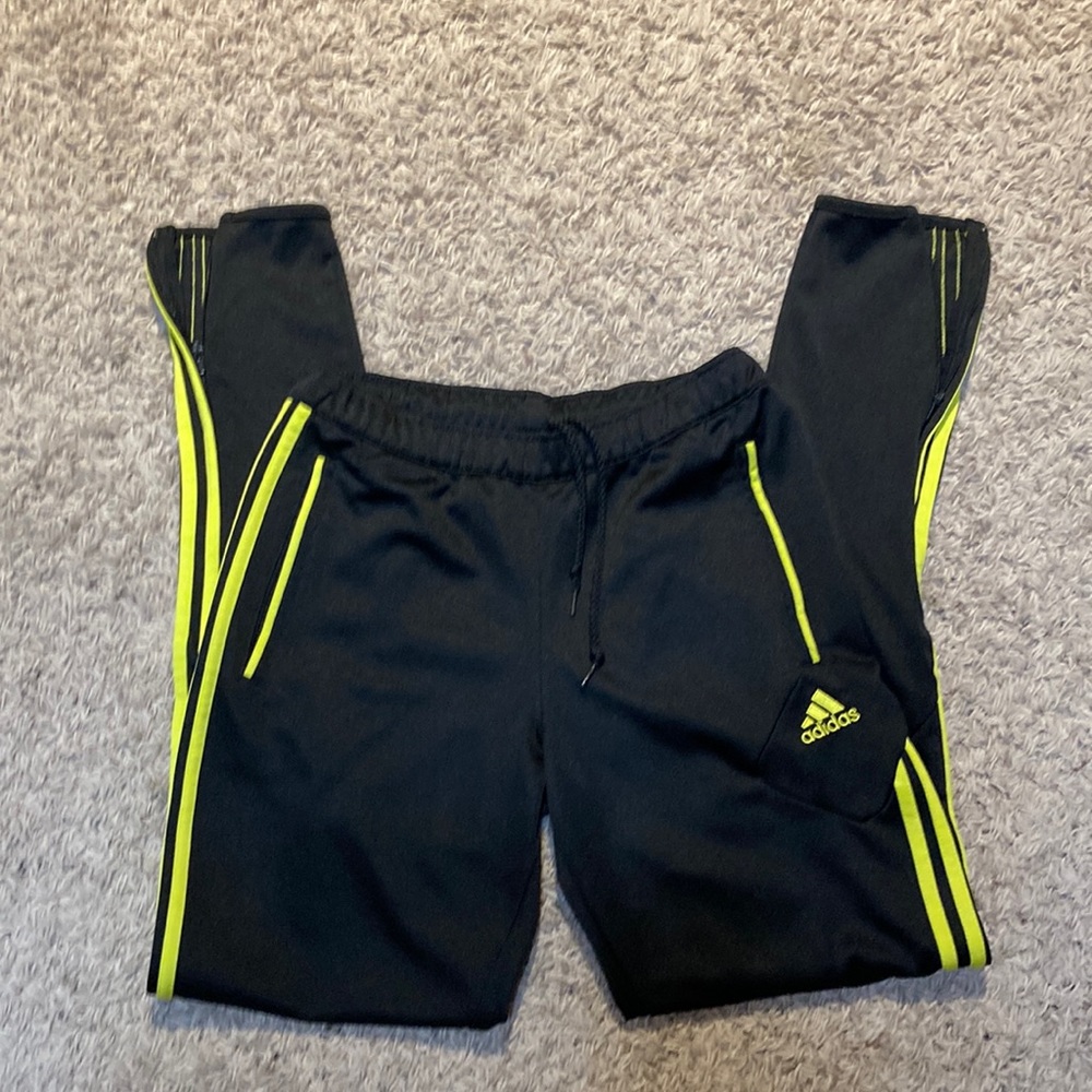 Adidas jogging pants.
